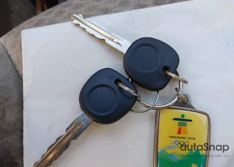 2005 Saturn Ion Ion 2 из США, поврежденный, VIN 1G8AJ52F25Z111601